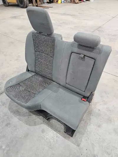 Rear passenger side seat from a 2015 Ram 5500 crew cab. Cloth. I believe it fits a range of crew cab...