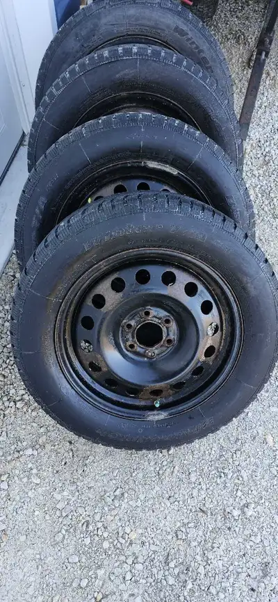 BF Goodrich tires on 6 bolt rims Came off a pontiac Montana SV6 Tread like new, very good traction.