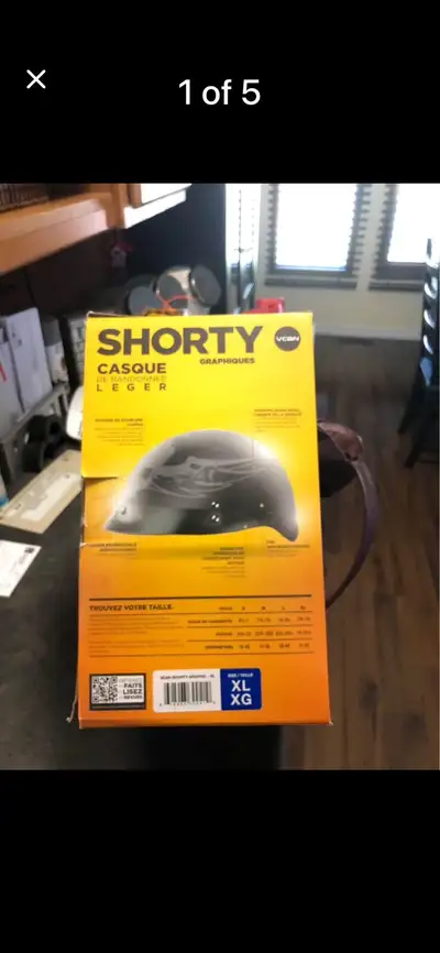 Stay safe on the road with this VCAN Shorty Graphic helmet, a reliable, used piece of gear in size X...