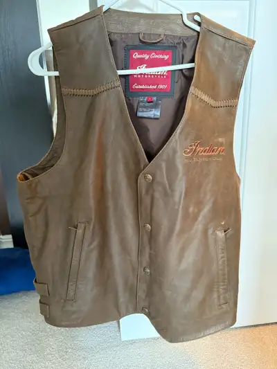 This Indian Motorcycle Vest is never worn, crafted from high-quality brown leather with detailed sti...