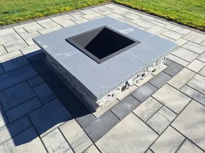 Custom made firepit inserts made with 10 gauge steel plate for stone brick and concrete surrounds we...