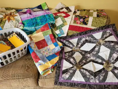 Selling quilt tops and material. Clean and in great shape. Not quilting anymore. Smoke free and pet...