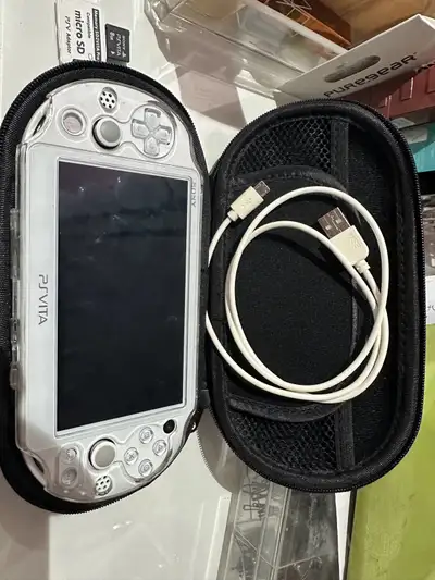 Selling a PS VITA 2000 in very good condition, comes with a protective case and travelling case. Add...