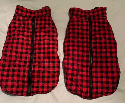 2 Light winter dog coats. One is slightly damaged, but has been repaired. They wash well in the laun...