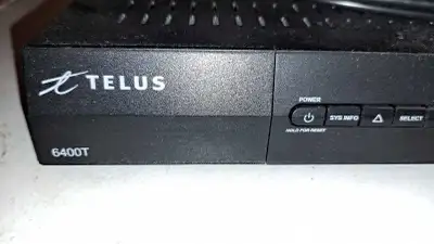 Model 6400T. Like new. Never used, only a display item. Includes unit, power cord, smart card and AV...