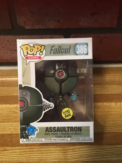 Rare FUNKO POP-GAMES-FALLOUT-ASSAULTRON #386 GLOW IN THE DARK.This Rare Vinyl Figure is brand new an...