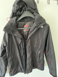 Manteau noir North face médium 