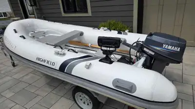 Excellent condition 2013 Highfield CL340 (11ft 2in) aluminum RIB paired with a highly desirable 2009...
