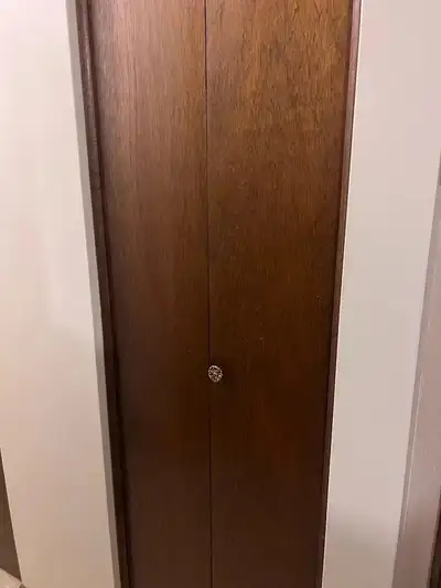 Bi-fold Hollow Wood Door with Track and Doorknob - $20, View more