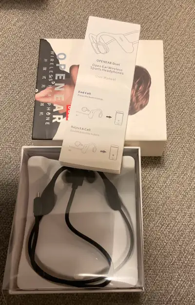 Wireless open ear Duet headphones., View more