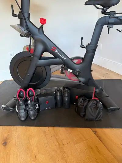 Peloton exercise bike in mint condition, has only been used a handful of times. Comes with many acce...