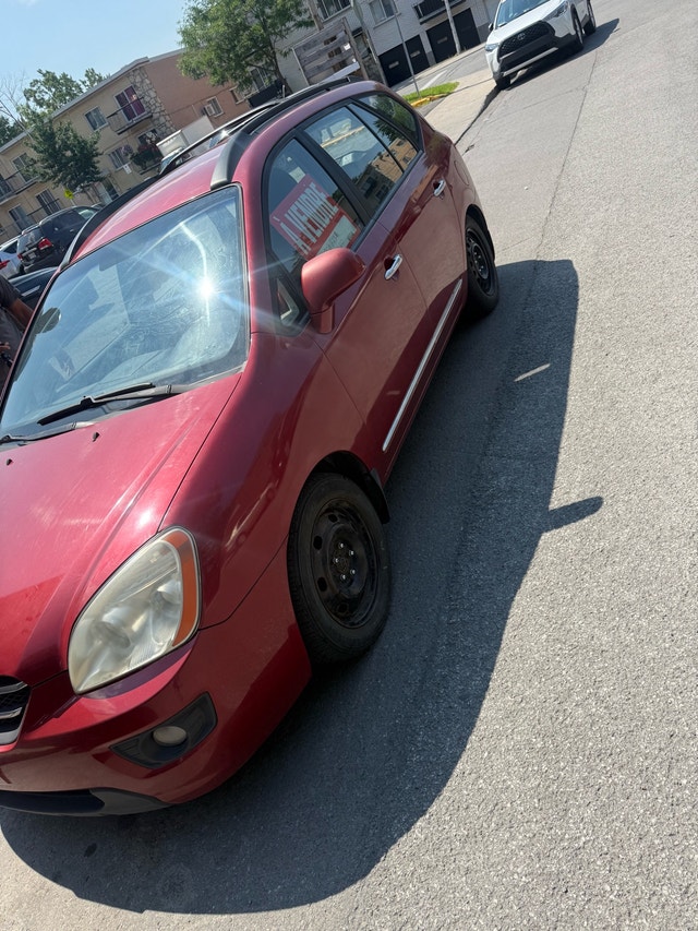 Kia Rondo — photo 2