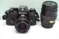 Nikon EM SLR camera outfit with 2 lenses – uses 35mm film