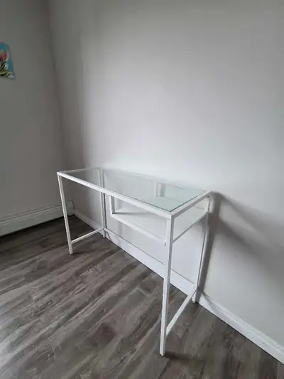 Glass console table with shelf – modern, slim, and clean. Price: $70 Pickup: Near Somerset / Bridlew...