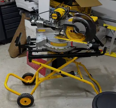 This is a Dewalt DWS780 12" double bevel, sliding compound miter saw, in used condition and ready fo...