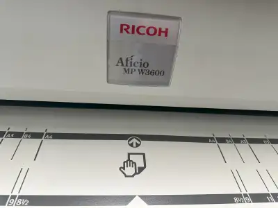 The Ricoh Aficio MP W3600 Wide Format Printer can print up to 36" wide drawings. This unit does not...