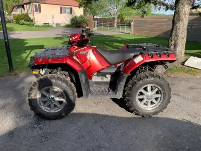 I'm selling a barley used 2014 Polaris Sportsman 850XP EPS, I’m the original owner, with only 1300km...