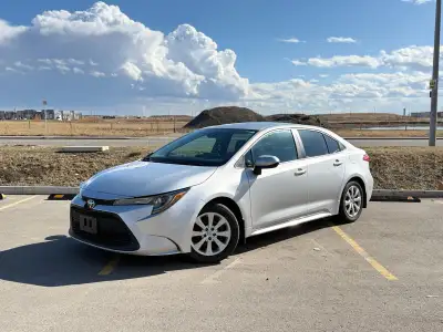 2021 Toyota Corolla LE – 143K KMS! ✅ Active status ✅ 1.8L 4-cylinder engine ✅ Backup camera, Bluetoo...