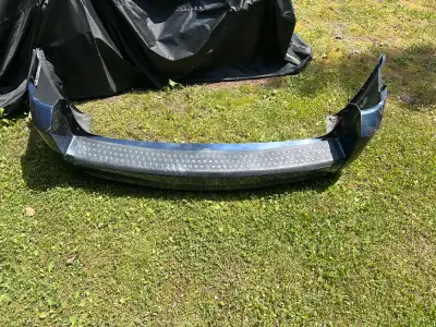 2008-2010 Grand Caravan bumper. Minor scratches and wear. Slight lift in center which is typical for...