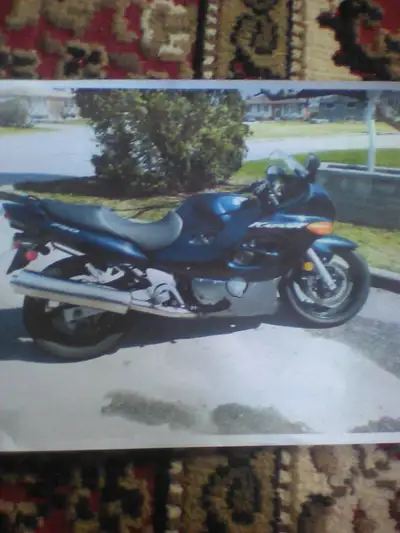 Certified, 2005 GSX 750 F Katana for sale. 20,800 km mileage. Includes cover, saddle bags, and cargo...