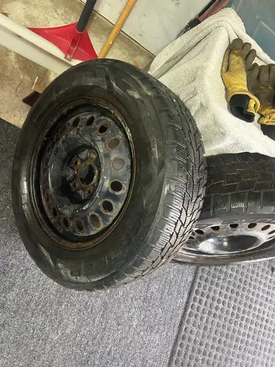 Cooper Evolution Winter Tires 225 65 17 on Dodge Caravan rims with a 5 x 127 (5 x 5) bolt pattern Th...