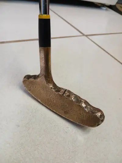 A Vintage  Brass Golf Putter, View more