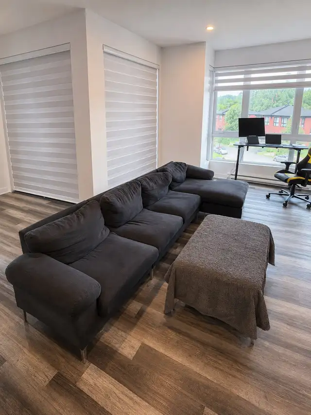 Wade Logan 131” Reversible Sectional Sofa + Ottoman