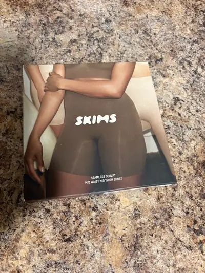 SKIMS Seamless Sculpt Mid-Waist Mid-Thigh Shorts, View more