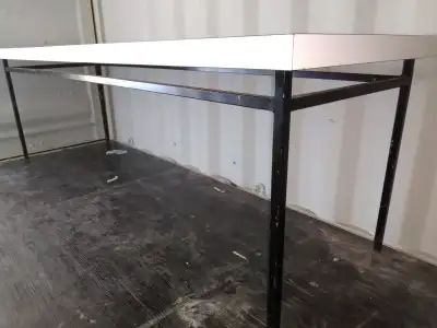 heavy non collapsible white laminate table wih steel legs, View more