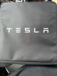 **NEW** Tesla Charger Never Used comes with the case