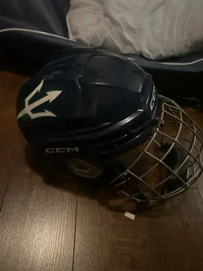 CCM Tacks 720 hockey helmet with 580 cage, View more