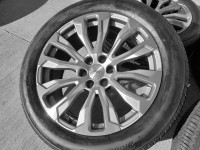 G3. 211SM GMC Chevy 22x9 rims and all season tires