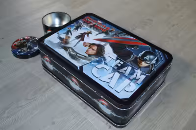 I have a new kid's lunch box for sale. With the Marvel characters. It also comes with a small contai...