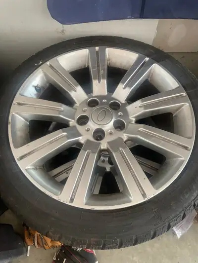 Selling a set of four Range Rover rims and tires, perfect for upgrading your ride. These rims are in...