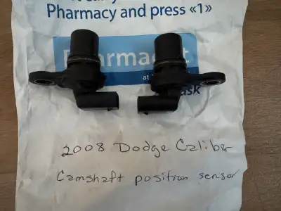 2008 Dodge Caliber camshaft position sensor, in good condition, $20 for both, $5 for the flashlight,...
