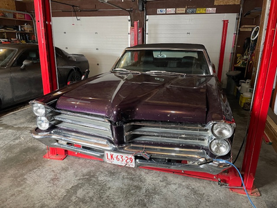 My dad wants to sell his 1965 Pontiac Parisienne Convertible. Car has been nicely restored and is in...