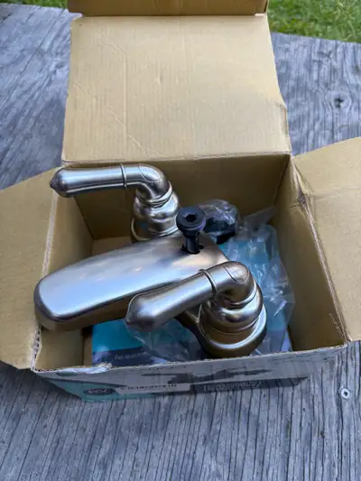 Brand new never used. Bought for tub when needed sink faucet