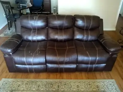 Seats three. Very comfortable. Cushions have lots of life left in them. Two reclining chairs, the mi...