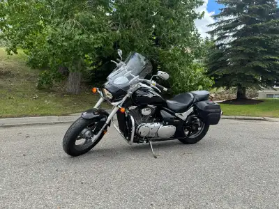 Own this stunning, well-maintained black 2012 Suzuki Boulevard M50 with only 18,800 km! Features gle...