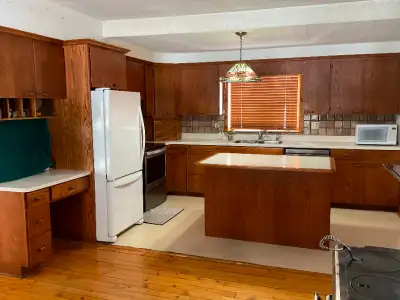 Medium Oak Hanover kitchen cabinets for sale complete with or without three oak high swivel island c...
