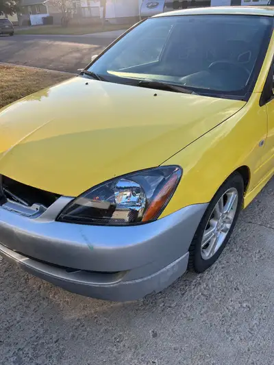 Have my lancer for sale, recently did an oil change as well as put in new headlights, battery, racin...