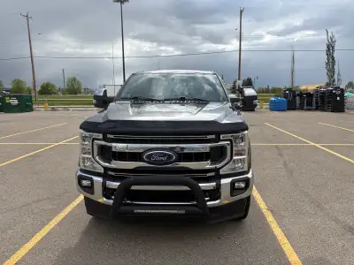 Ford F250 4x4 in excellent condition 6.2l gas engine automatic, new tires, Fifth Wheel hitch, Moon r...