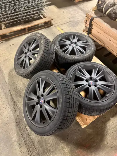 $300 each OBO Saab 93 rims with winter tires, they were painted black and the paint has come off in...