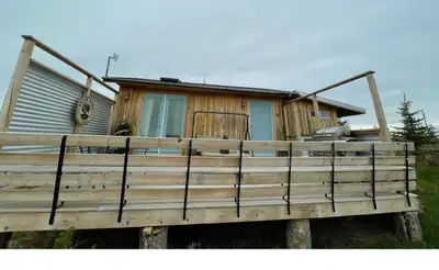 King sized studio cottage with full kitchenette, main and French doors, double skylights, full bathr...