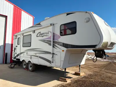 This camper is in great condition! -Brand new awning -Air conditioner -Queen size bed -Couch folds i...