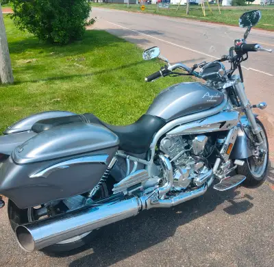 This is a beauty of a bike. Lots of chrome, sleek design, manufactured hardcover saddle bags, and a...