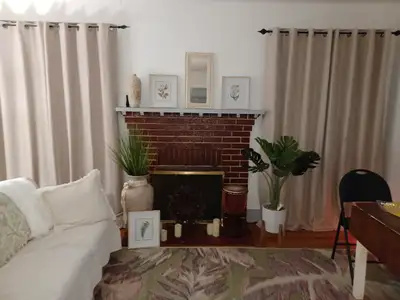 Central downtown, sun porch, one bedroom main, plus two bedroom