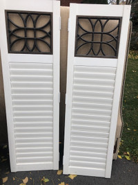 Two White Window Shutters, with decorative insert.