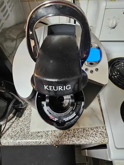 I'm selling a used Keurig K60 single-cup brewing system, perfect for quickly making your favourite h...