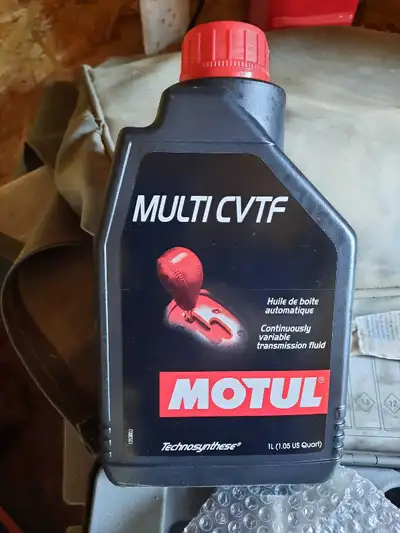 I'm selling a 1-liter bottle of Motul Multi CVTF Technosynthese transmission fluid. This is a high-q...
